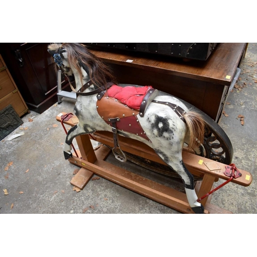 1326 - A dapple grey rocking horse. 