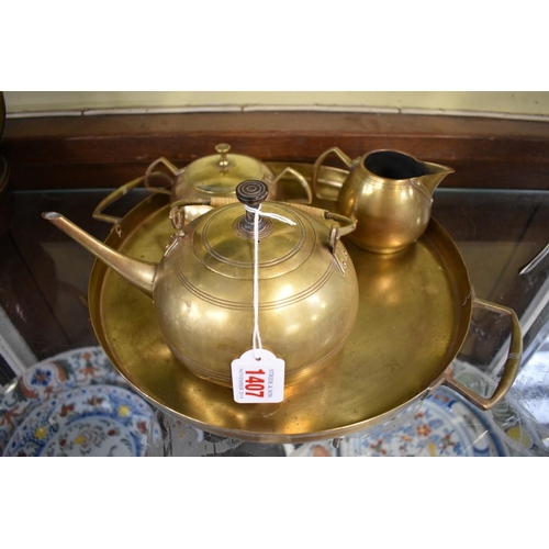 1407 - A Dutch Secessionist style brass teaset and tray, the tray 37cm wide. 