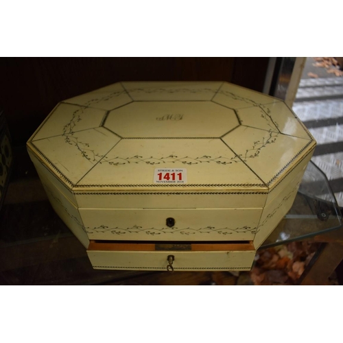 1411 - A 19th century Vizagapatam ivory and penwork octagonal work box, the hinged top initialed 'JMY', 33.... 