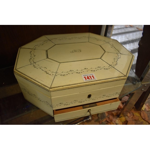 1411 - A 19th century Vizagapatam ivory and penwork octagonal work box, the hinged top initialed 'JMY', 33.... 