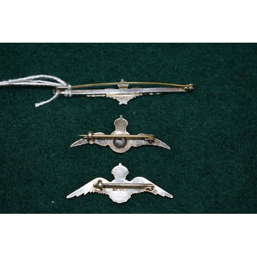 512 - A silver RAF bar brooch, 57mm; together with two silver and enamel sweetheart brooches, (3).... 