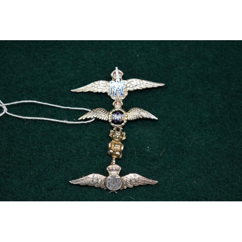 514 - A silver and enamel RAF sweetheart brooch with lucky pixie; together with two other RAF examples, on... 