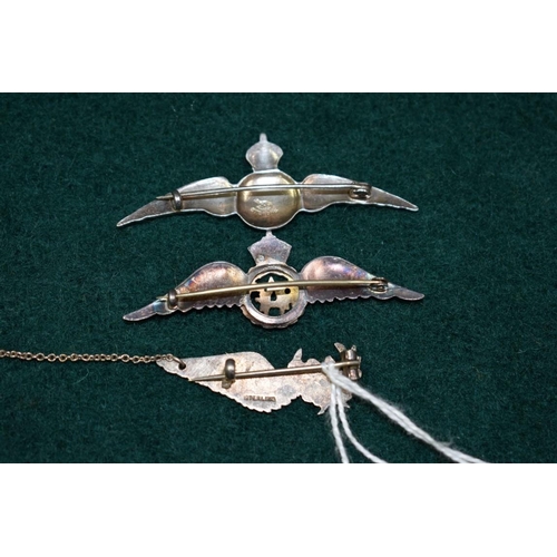 514 - A silver and enamel RAF sweetheart brooch with lucky pixie; together with two other RAF examples, on... 