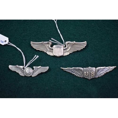 548 - Three silver US Airforce wings, ranks; Pilot by Tiffany & Co, WWl era; Pilot by Amcraft; and Air... 