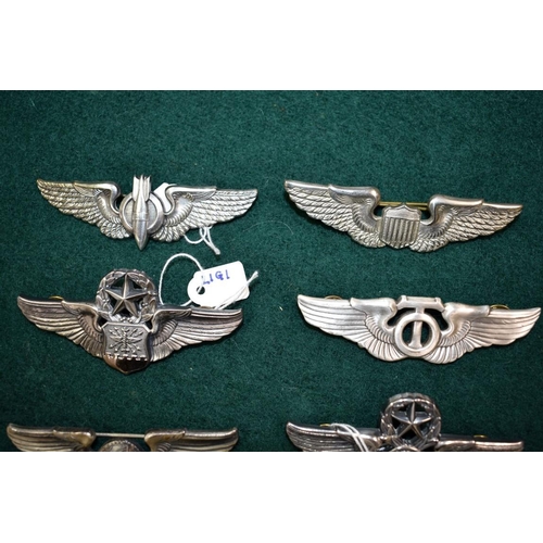 554 - A group of seven US Airforce wings of various ranks, to include; Command Navigator; Bombardier by Fi... 