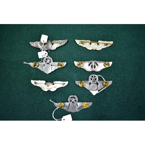 554 - A group of seven US Airforce wings of various ranks, to include; Command Navigator; Bombardier by Fi... 