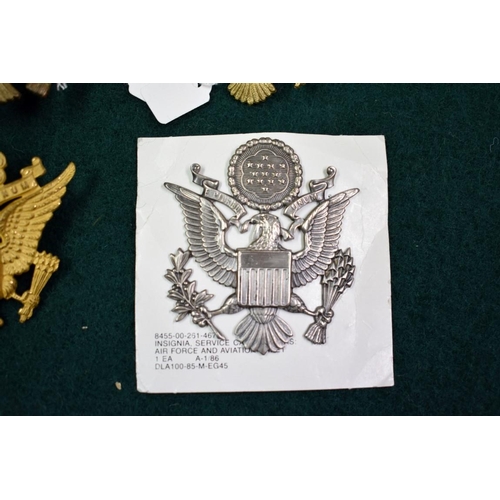 557 - Six US Army Airforce Officer cap badges, to include examples by Ludlow of London and Meyer, (6).... 