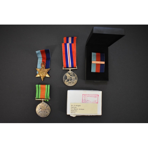 565 - Medals: a World War II trio, to 130125 Fg Off Reginald James Wright, comprising: 1939-45 Star, with ... 