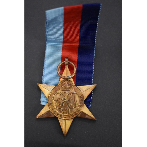 565 - Medals: a World War II trio, to 130125 Fg Off Reginald James Wright, comprising: 1939-45 Star, with ... 