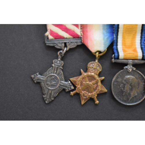 571 - Medals: an Air Force Cross, boxed; together with a miniature group of eight to Group Capt. E.R. Open... 