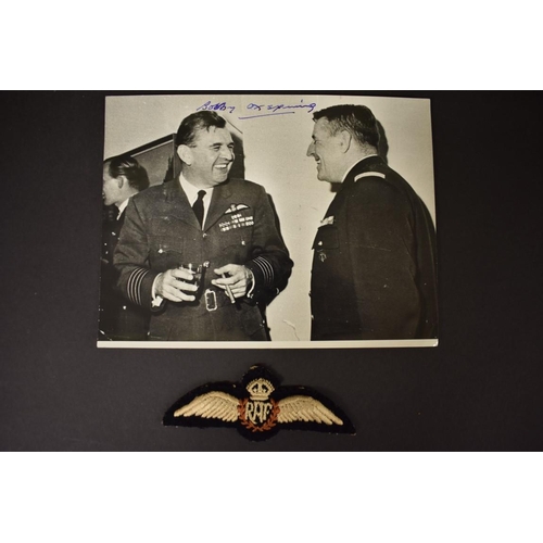 645 - An autographed black and white photograph of Group Captain R W Oxspring DFC AFC, circa 1966, with re... 