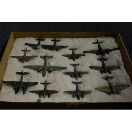 652 - A collection of diecast and resin German planes. (37)