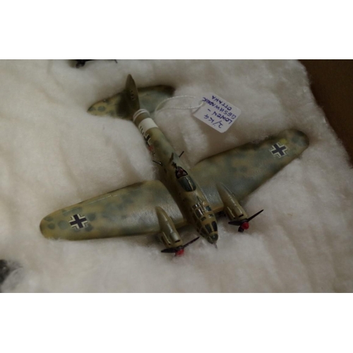 652 - A collection of diecast and resin German planes. (37)