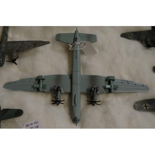 652 - A collection of diecast and resin German planes. (37)