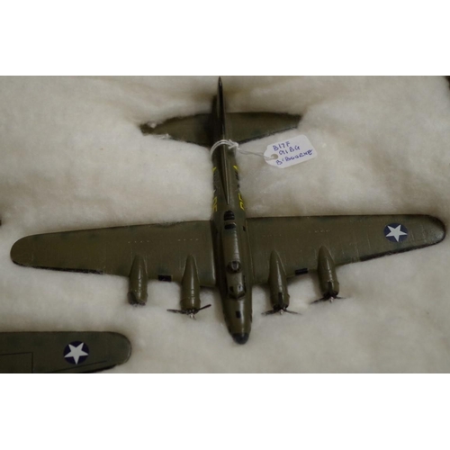 653 - A collection of diecast and resin US planes. (23)