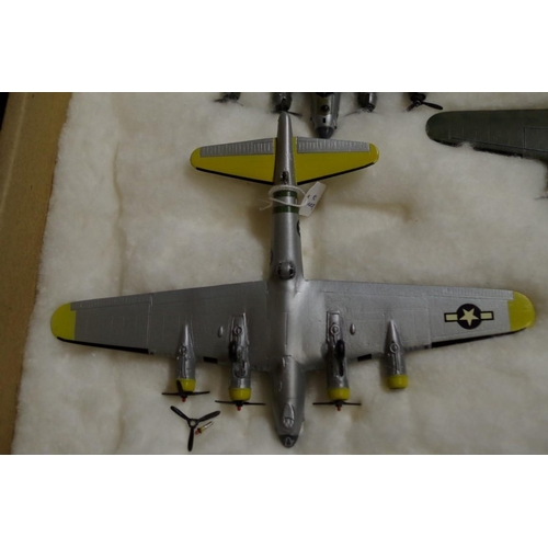 653 - A collection of diecast and resin US planes. (23)