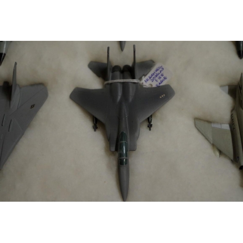 653 - A collection of diecast and resin US planes. (23)