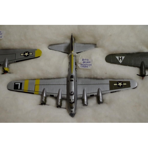 653 - A collection of diecast and resin US planes. (23)