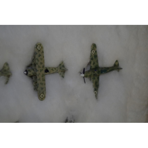 654 - A collection of diecast and resin planes. (38)