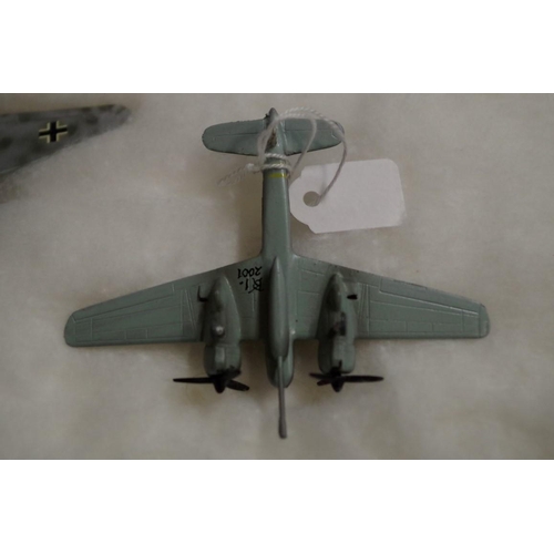 654 - A collection of diecast and resin planes. (38)