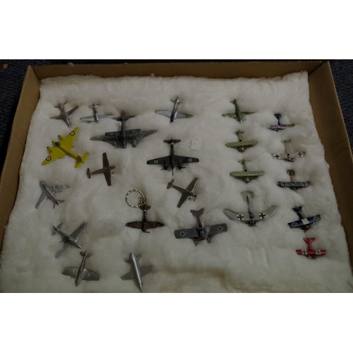 654 - A collection of diecast and resin planes. (38)