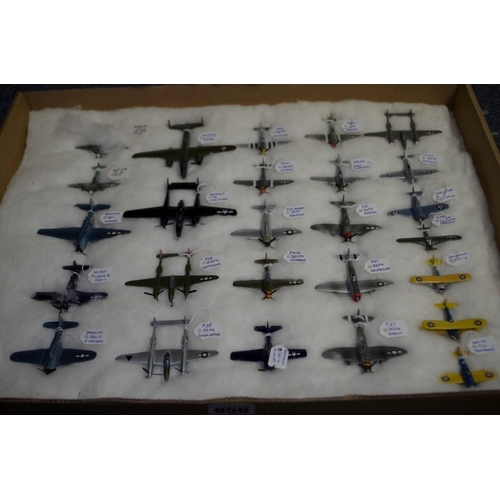 656 - A collection of diecast and resin planes. (32)