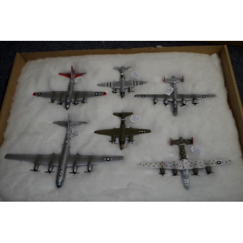 656 - A collection of diecast and resin planes. (32)