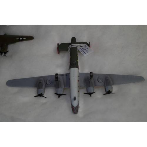 656 - A collection of diecast and resin planes. (32)