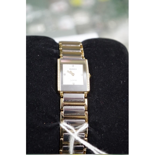 140 - A Rado Jubile ladies tank style wristwatch, set diamonds to sides and face, complete with original b... 