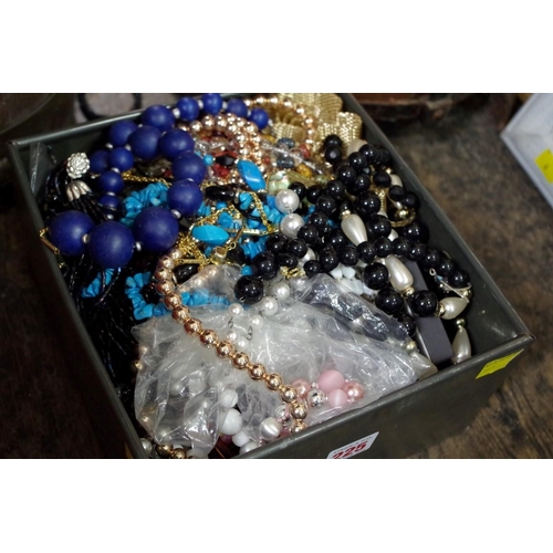 225 - A quantity of mixed costume jewellery, mainly beaded necklaces.