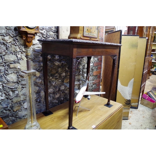 1055 - A late Victorian carved walnut rectangular occasional table, 74.5cm wide.