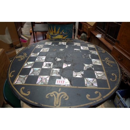 1117 - A Victorian papier-mache circular tripod table, the tilt top with chequerboard inlay, 47cm diameter,... 