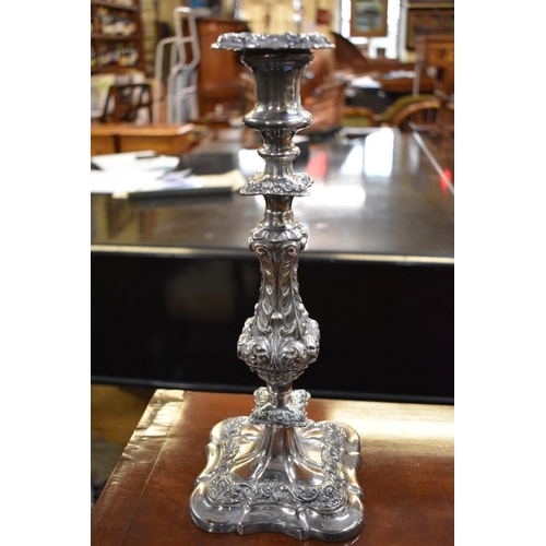 194 - A pair of Georgian style silver plated candlesticks, 33cm; together with a similar plated candelabra... 