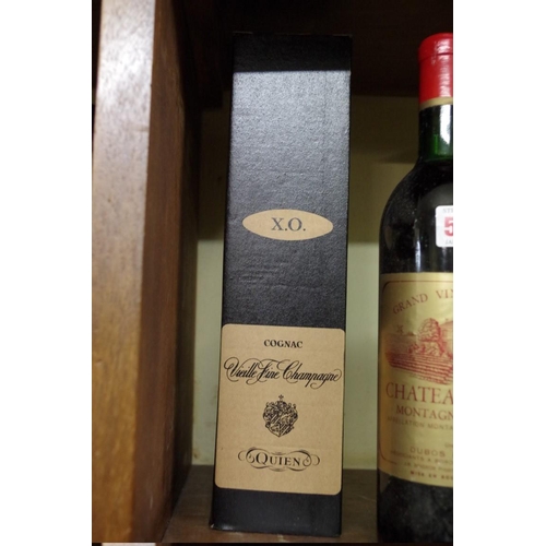 570 - A 70cl bottle of Quien XO Vieille Fine Champagne Cognac.