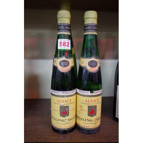 582 - Three 37.5cl bottles of 1983 Hugel Riesling Reserve Personelle; together with one 75cl bottle of 198... 