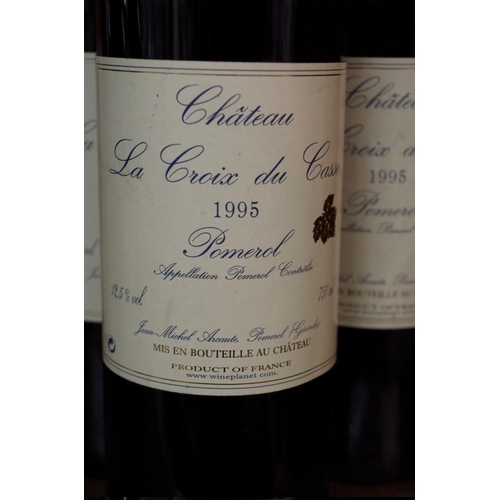 584 - Three 75cl bottles of 1995 Chateau La Croix du Casse, Pomerol. (3)