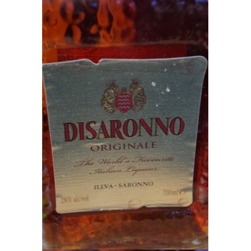 586 - Six various bottles of spirit, comprising: a 70cl Disaronno; a 70cl Pusser's Rum, 54.5% abv; a 1 lit... 