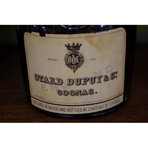 574 - A bottle of Otard Dupuy 1865 cognac, circa 1930s bottling.