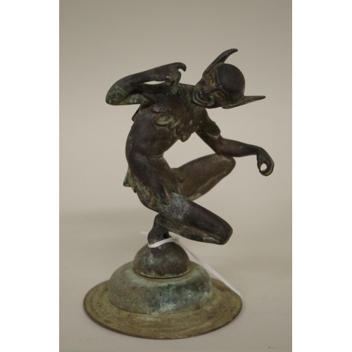 562 - A vintage verdigris goblin or pixie car mascot, 12.5cm high.