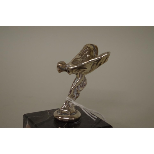 563 - A Rolls-Royce 'Spirit of Ecstasy' paperweight, on marble base, total height 8cm.