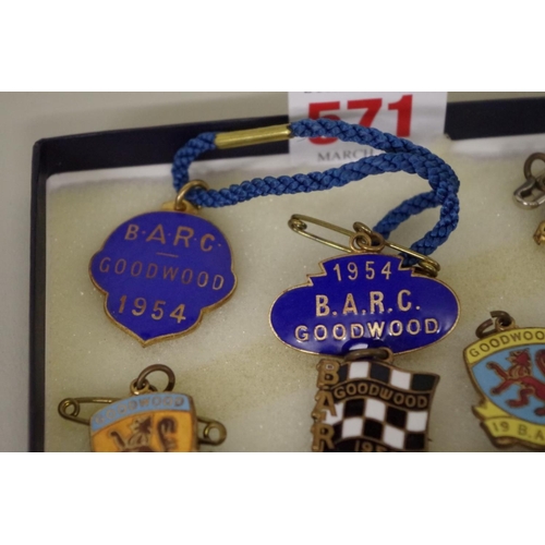 571 - Goodwood: seven enamel B.A.R.C. badges, comprising: 1954, with pendant; 1959, with pendant; 1962; 19... 