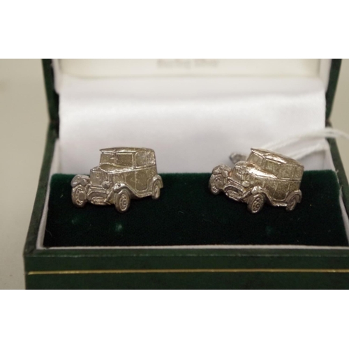 577 - Goodwood: a pair of silver 'Old Speckled Hen' cufflinks, in box.