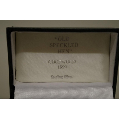 577 - Goodwood: a pair of silver 'Old Speckled Hen' cufflinks, in box.