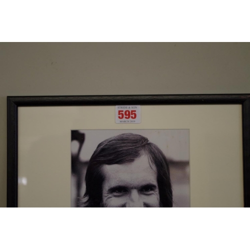 595 - Photographs: a black and white image of Emerson Fittipaldi, signed to reserved margin in mount,... 