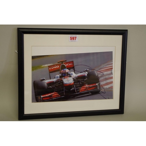 597 - Photographs: a colour image of Jensen Button in McLaren, signed, image 19 x 30cm.... 