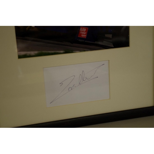 599 - Photographs: a colour image of Jacques Villeneuve in Williams, signed to reserved margin in mou... 