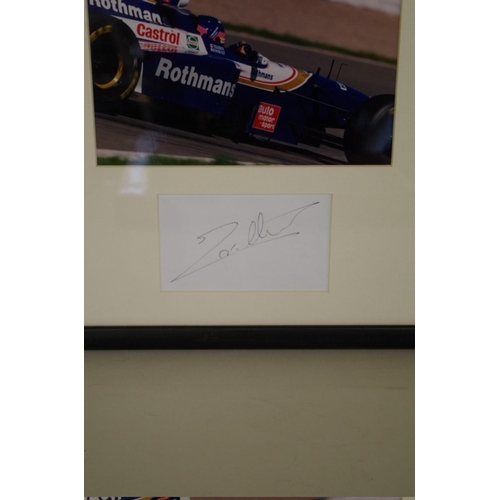 599 - Photographs: a colour image of Jacques Villeneuve in Williams, signed to reserved margin in mou... 