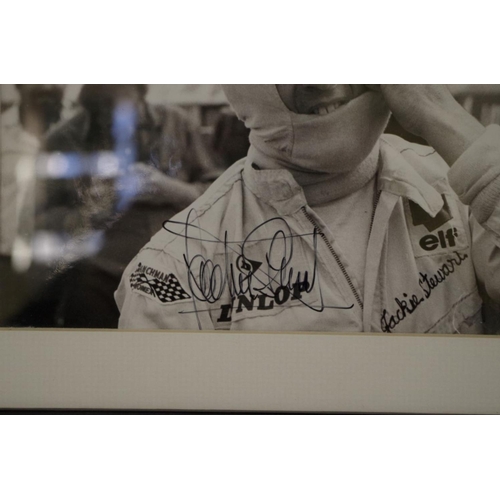 600 - Photographs: a black and white image of Jackie Stewart, signed, 14 x 19cm. ... 