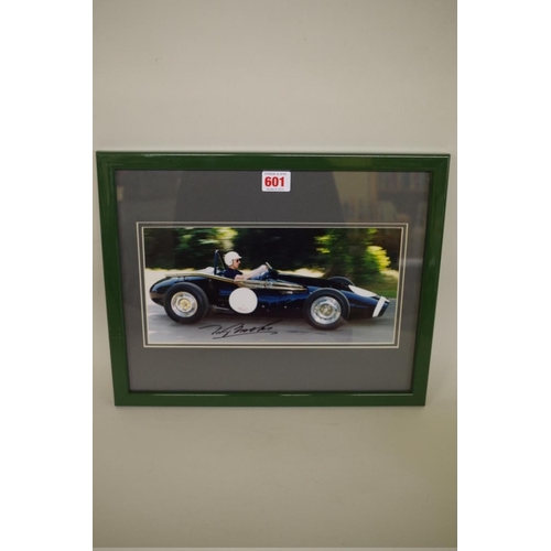 601 - Photographs: a colour image of Tony Brooks in vintage Grand Prix car, signed, 14 x 29.5cm. ... 