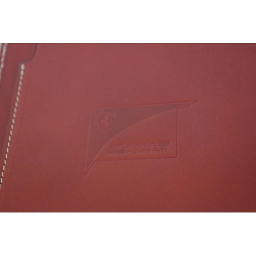 636 - Ferrari: three red leather diaries, 2006, 2014 and 2017, latter boxed. ... 